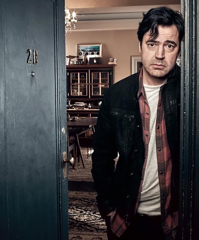 Loudermilk in his Apartment Door