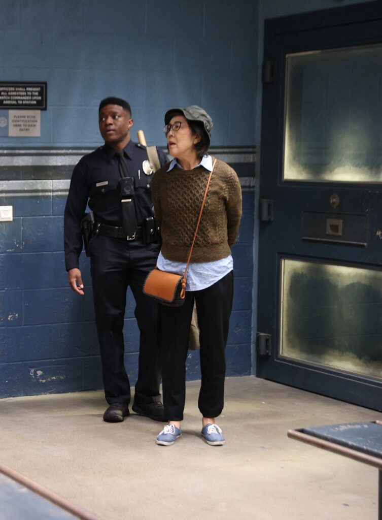 Thorsten Escorts to Lockup -tall - The Rookie Season 4 Episode 6