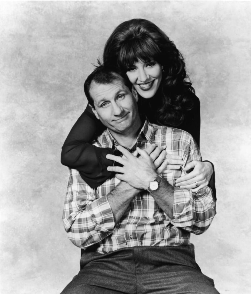 Promotional portrait of actors Ed O'Neill and Katey Sagal for the television series 'Married with Children,' 1993.