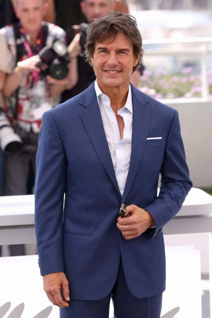 Tom Cruise attends a cast photo call for