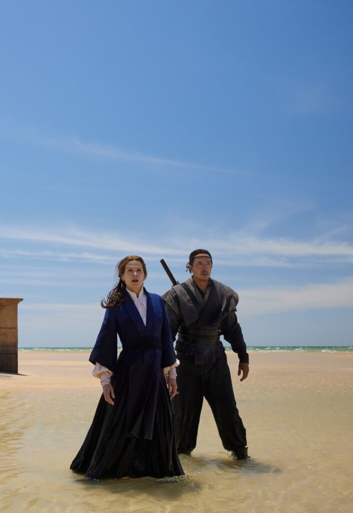 Moiraine and Lan on a Beach - The Wheel of Time Season 2 Episode 8