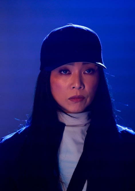 Jenn headshot in baseball cap