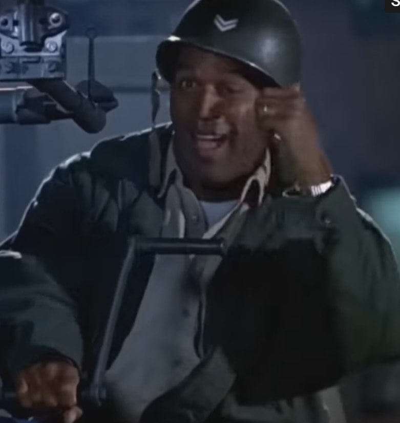 OJ Simpson sitting on a gun