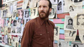 Linder at the Wall of the Missing