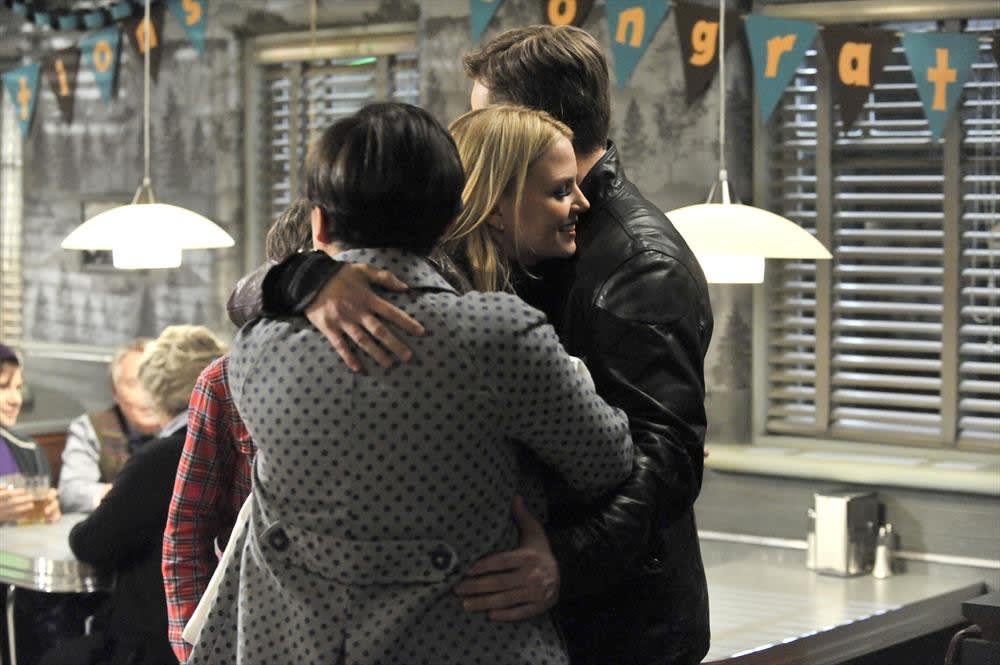 Emma Hugs Her Parents