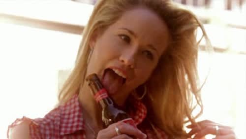 Sarah Newlin Licks a Beer Bottle