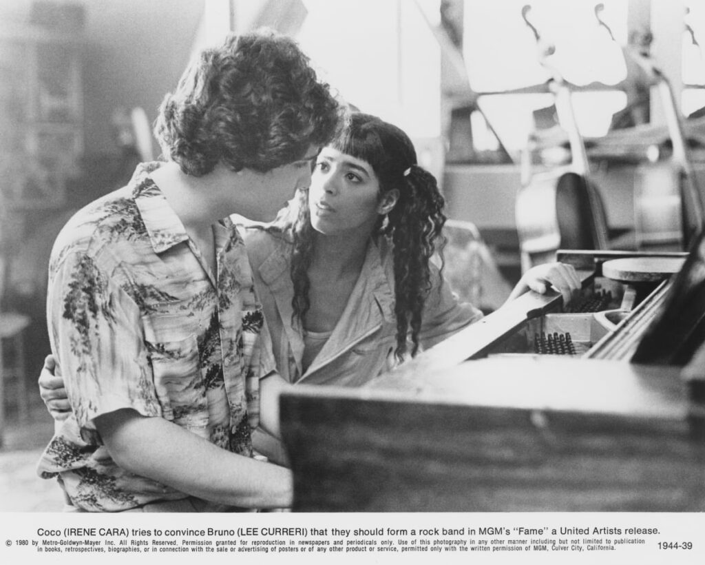 Bruno Martelli (Lee Curreri) tries to convince Coco Hernandez (Irene Cara) that they should form a rock band,
