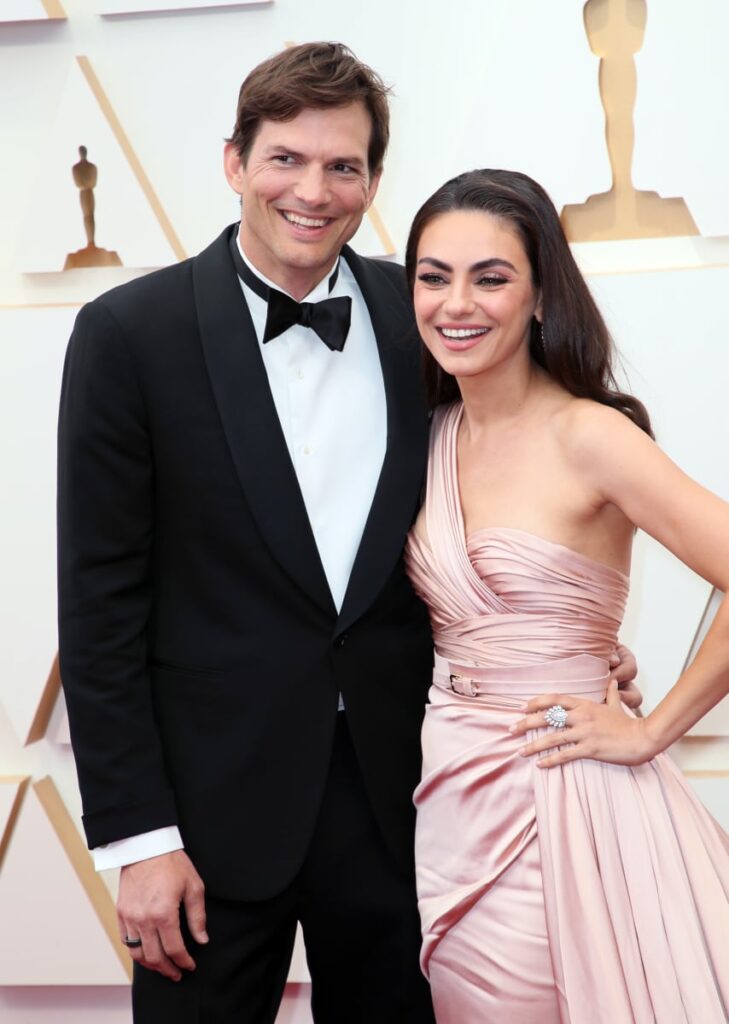 Ashton Kutcher and Mila Kunis attend the 94th Annual Academy Awards