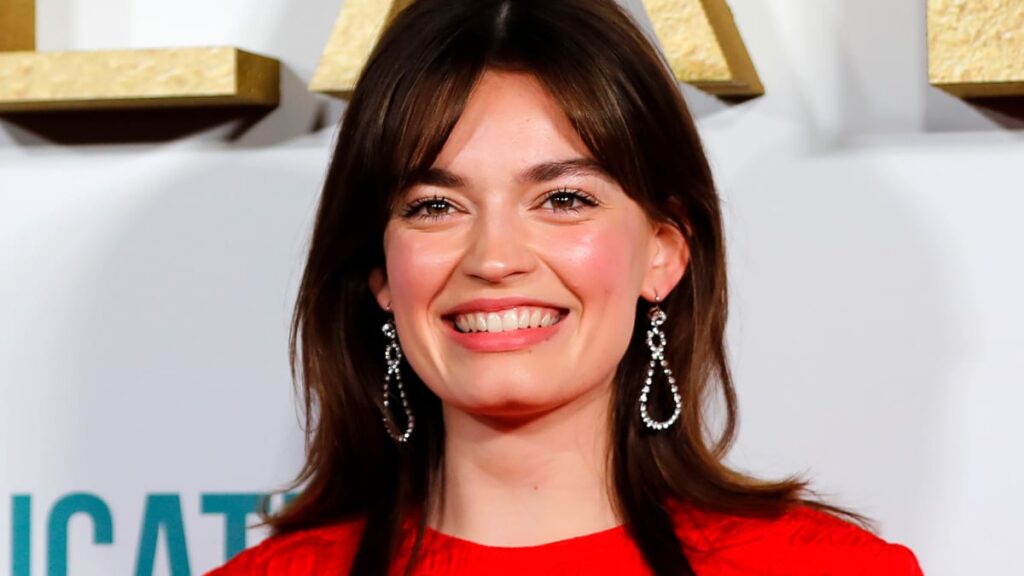 Emma MacKey poses after arriving to attend the World Premiere of Netflix's