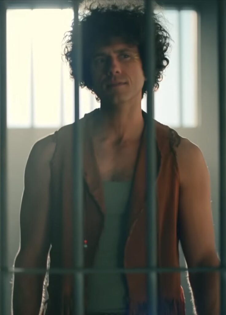 Topher behind bars - Schmigadoon!