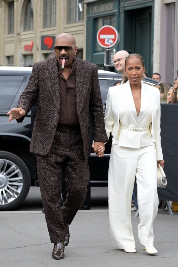 US actor and media host Steve Harvey and Marjorie Harvey arrive at the Fendi show