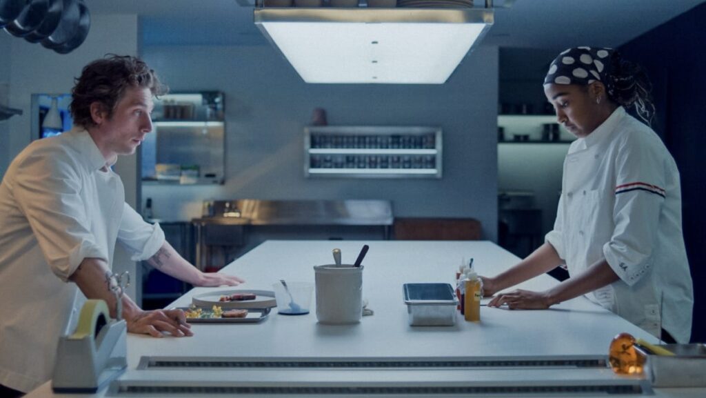 Carmy (Jeremy Allen White) and Sydney (Ayo Edebiri) in the kitchen on The Bear 