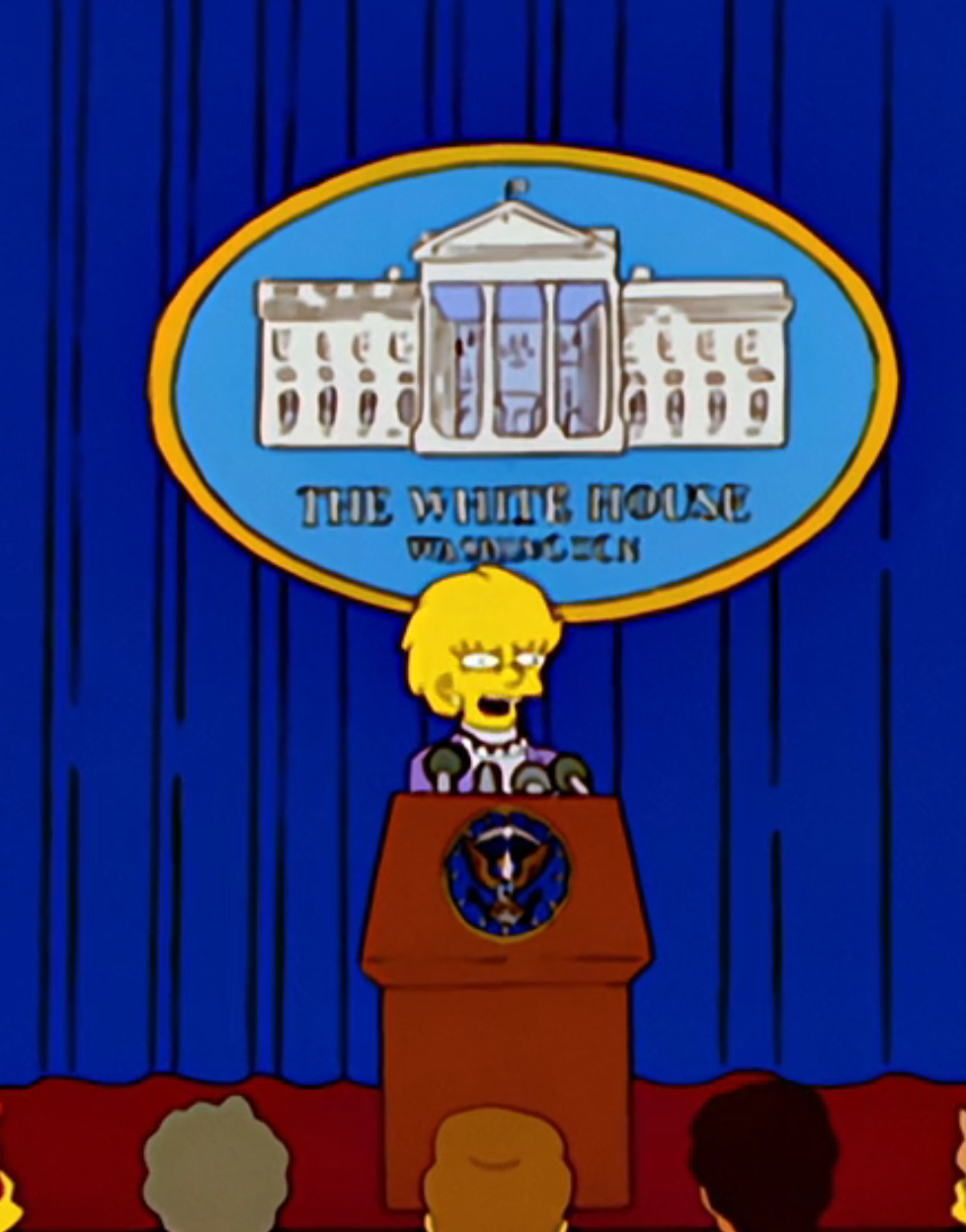 Lisa discursa nos EUA como a primeira mulher presidente em um episódio de Os Simpsons de 2000.