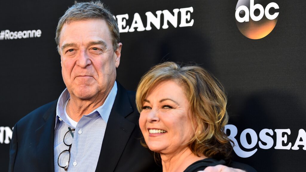  John Goodman and Roseanne Barr attend the premiere of ABC's "Roseanne" at Walt Disney Studio Lot on March 23, 2018 in Burbank, California. 