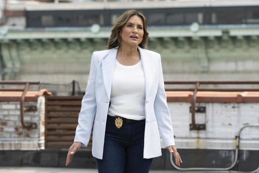 Benson standing on a roof wearing a white jacket on Law & Order; SVU Season 26 Episode 4