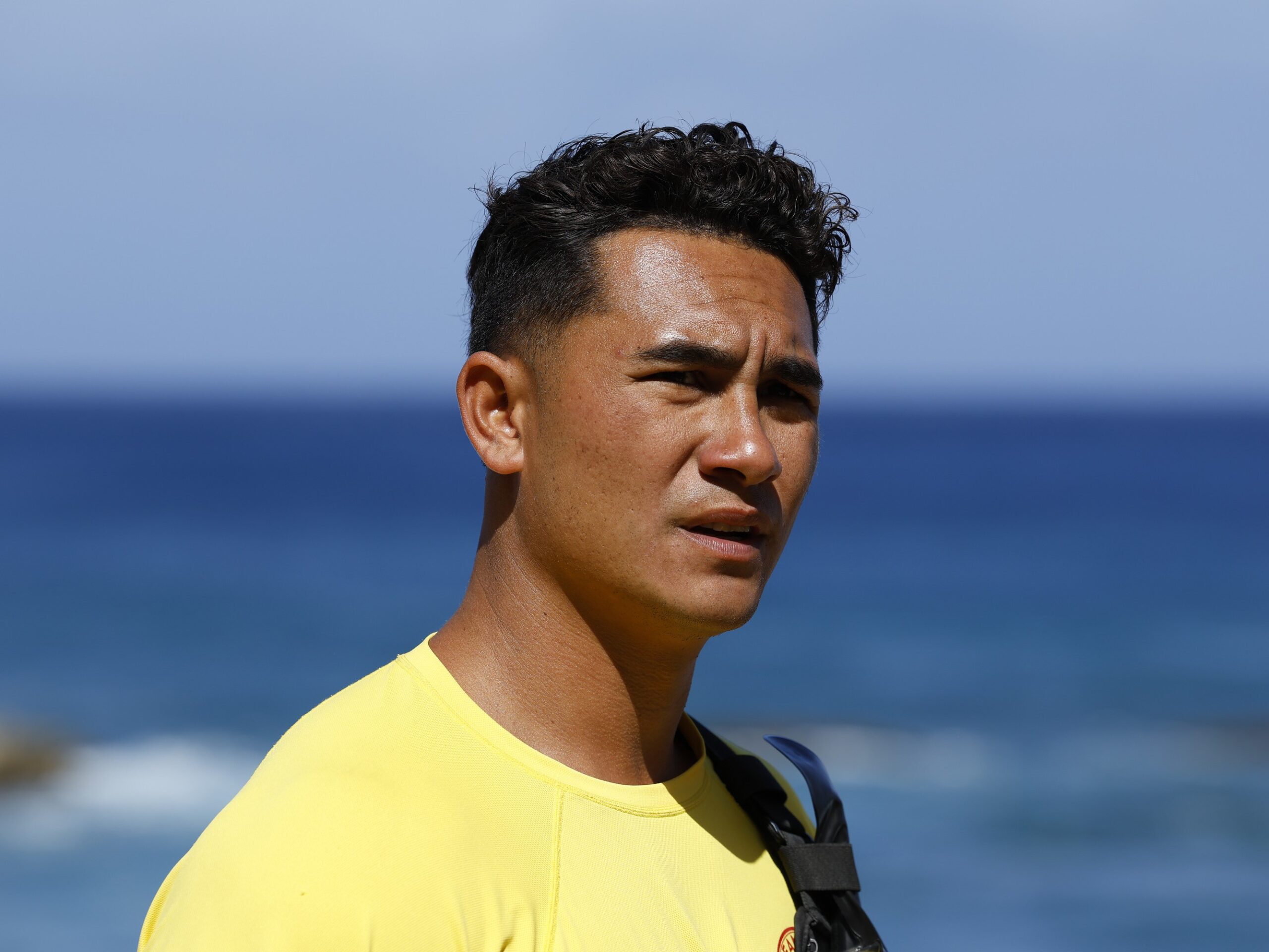 Laka walks the beach during Rescue: HI-Surf Season 1 Episode 8.