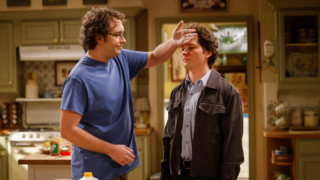 Connor puts the back of his hand against Georgie's forehead on Georgie & Mandy's First Marriage Season 1 Episode 12