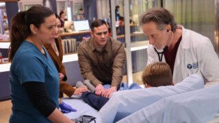 Archer listens to a young boy's heart on Chicago Med Season 10 Episode 17