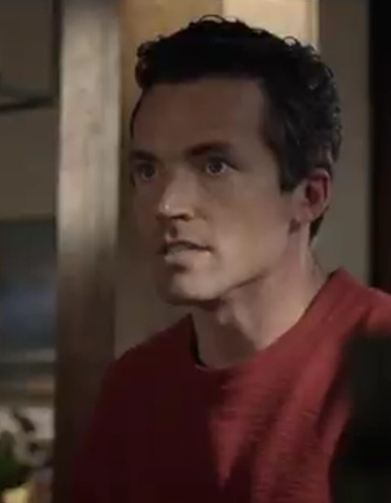 Ian Harding as Coach Hagen in Long Slow Exhale