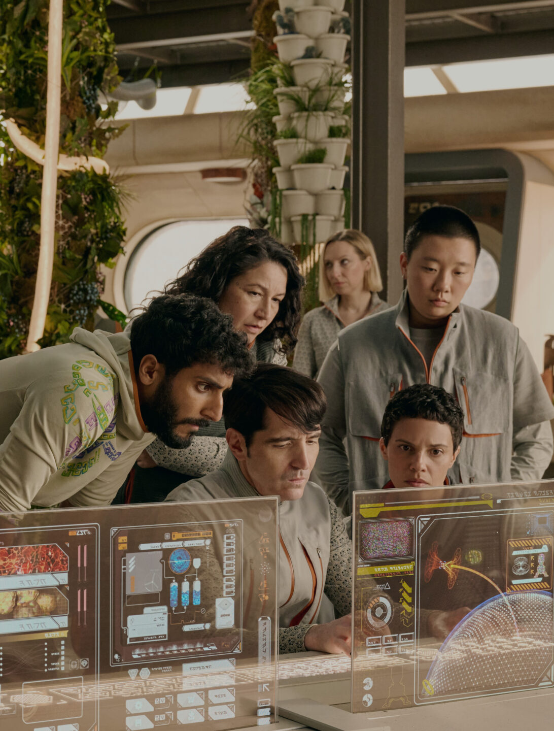 Alexander Skarsgård, Anna Konle, David Dastmalchian, Sabrina Wu, Akshay Khanna, Tamara Podemski, and Tattiawna Jones in Murderbot