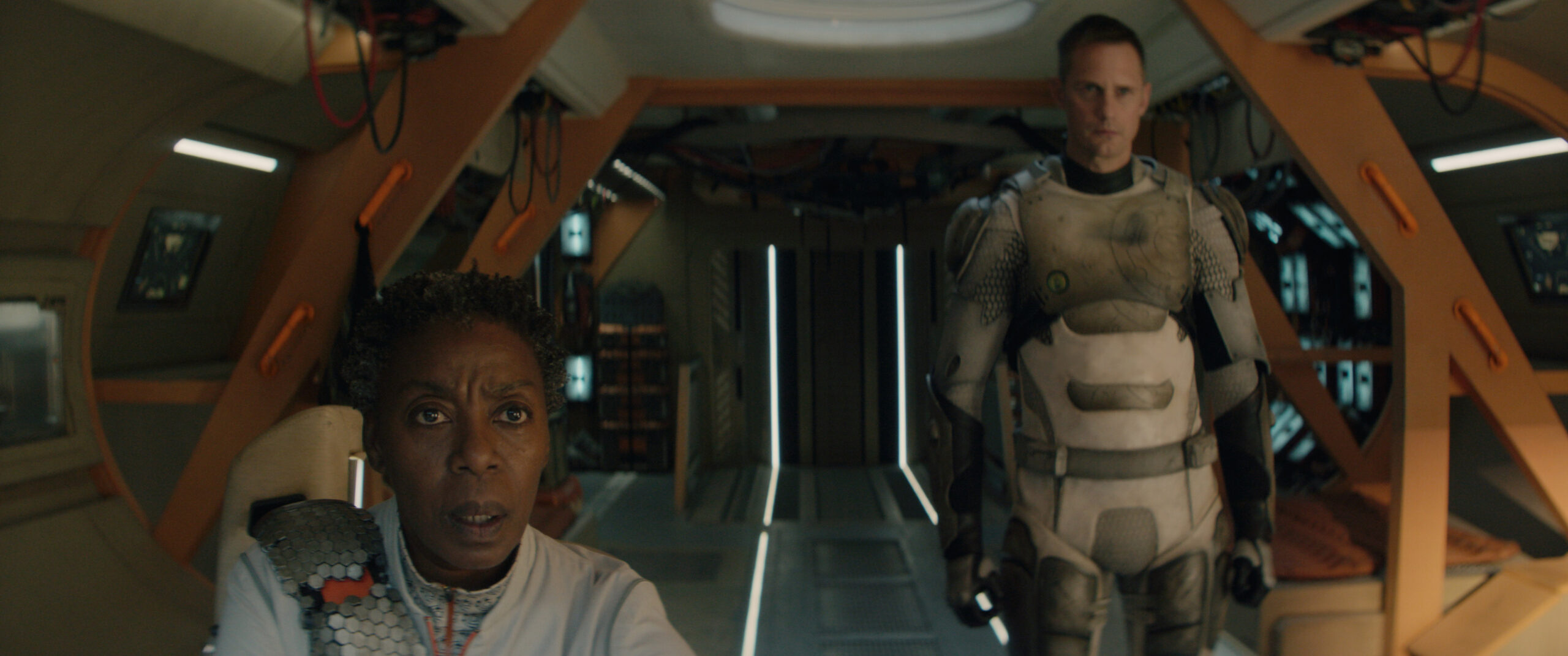 Alexander Skarsgård and Noma Dumezweni in Murderbot