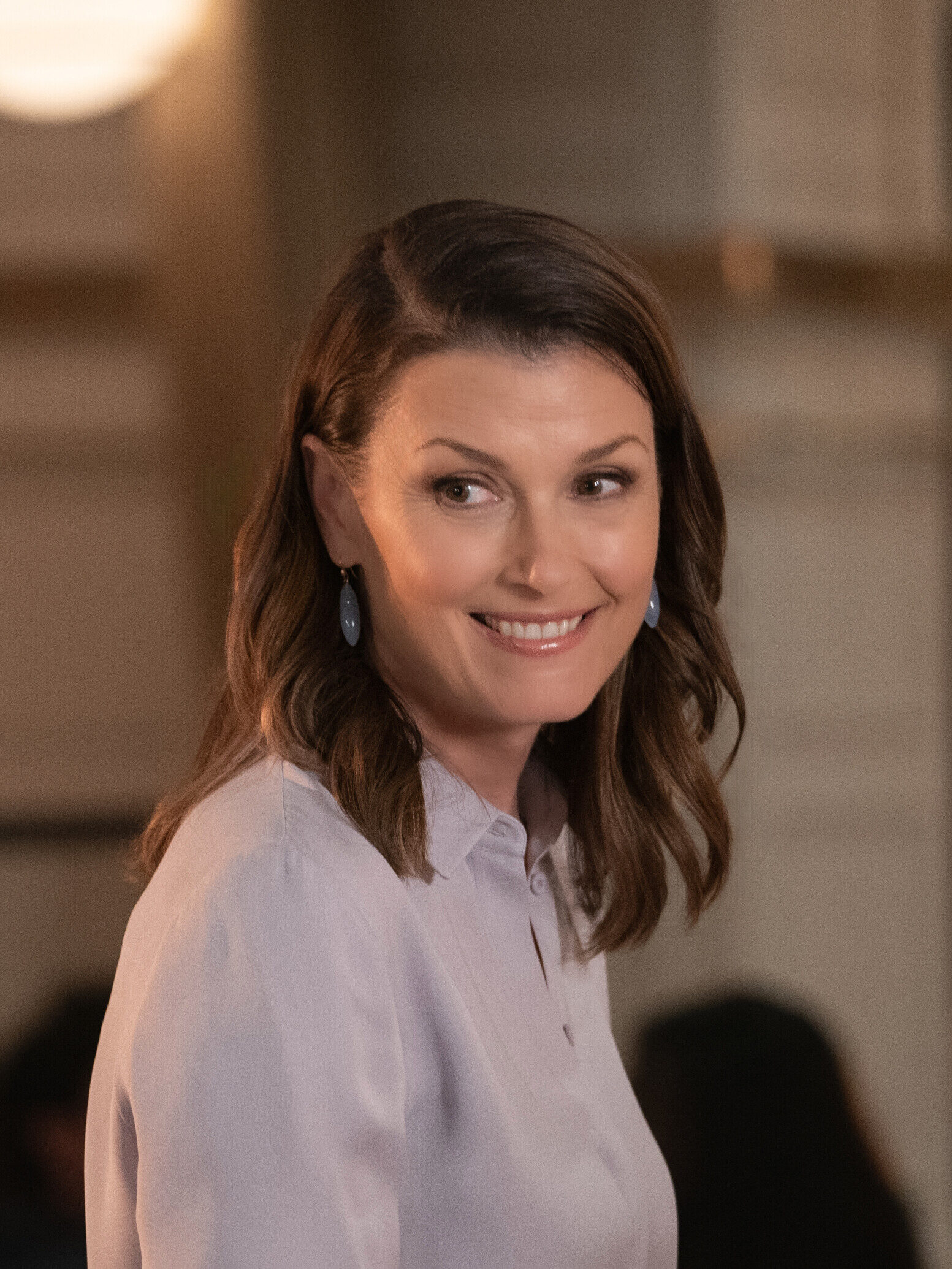 Erin smiling on Blue Bloods Season 14 Episode 17