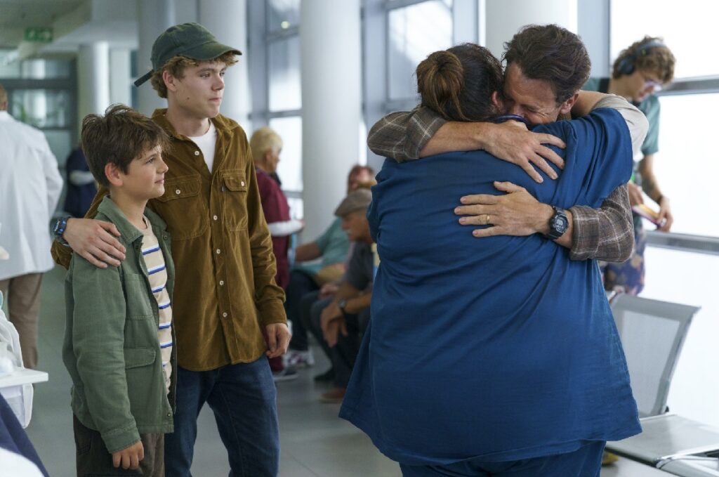 Nichole Jolly reunites with her family in Lifetime's Faith in the Flames: The Nicholle Jolly Story. Starring Chrissy Metz.