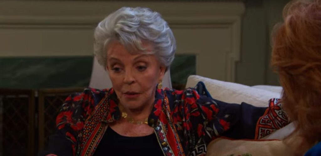 Julie looks upset while talking to Maggie on Days of Our Lives during the week of 9-08-25