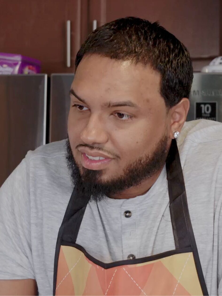 Michael in the kitchen wearing an apron on Life After Lockup Season 6