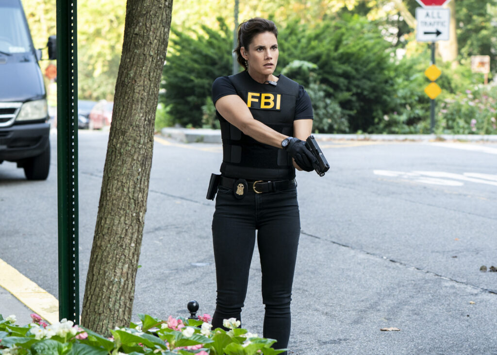 Maggie with her gun drawn on FBI Season 8 Episode 2