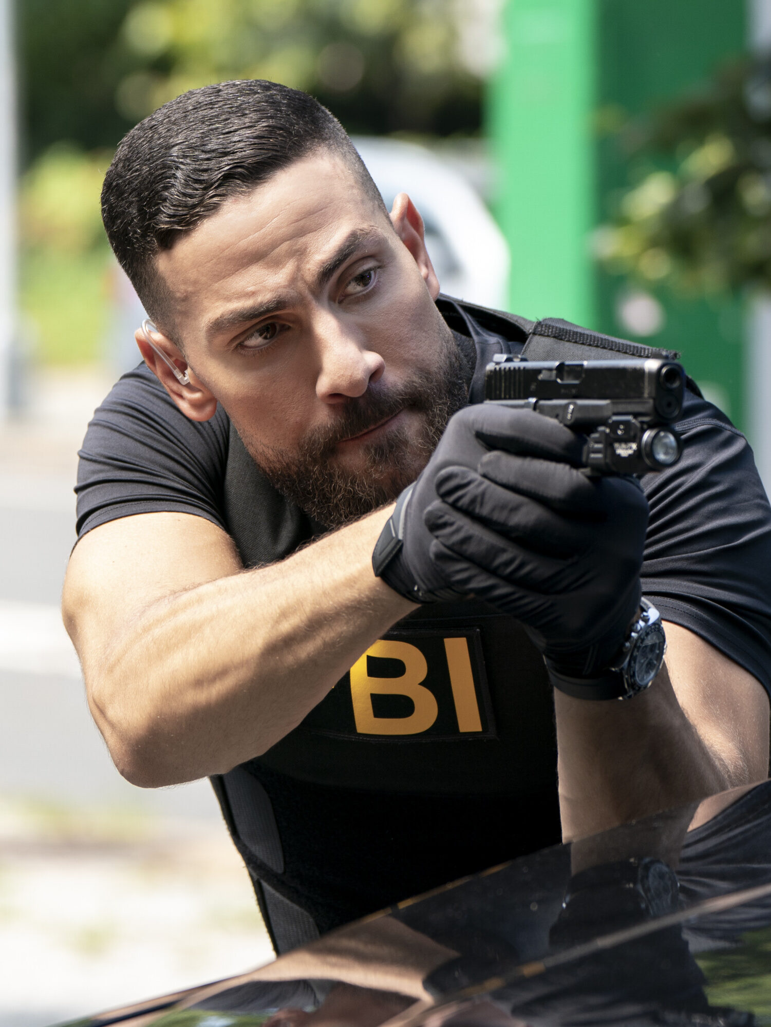 OA pointing his gun at someone on FBI Season 8 Episode 2