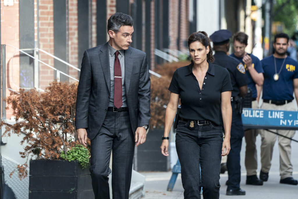 Scola and Maggie walk together down the street on FBI Season 8 Episode 2