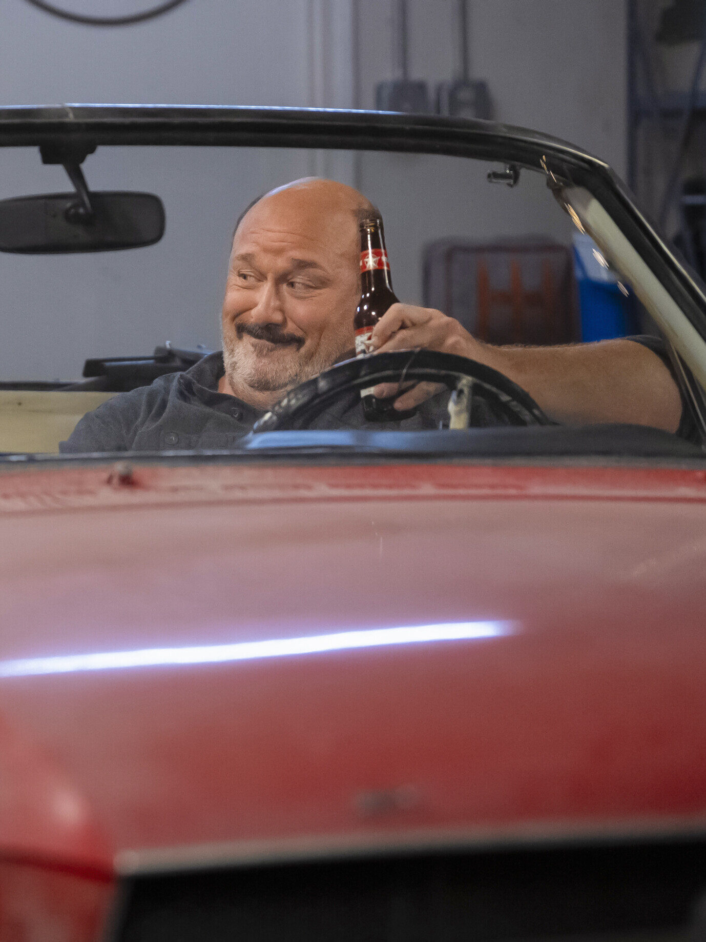 Mandy and Jim sit in the Mustang on Georgie & Mandy's First Marriage Season 2 Episode 1