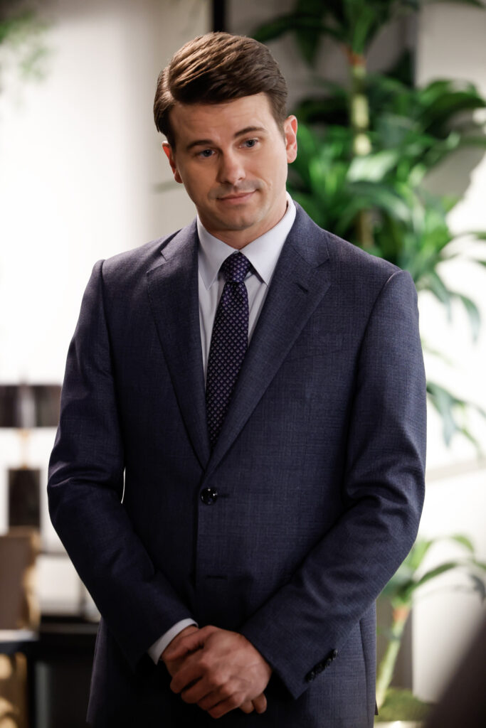 Julian standing with his arms crossed in front of him on Matlock Season 2 Episode 4