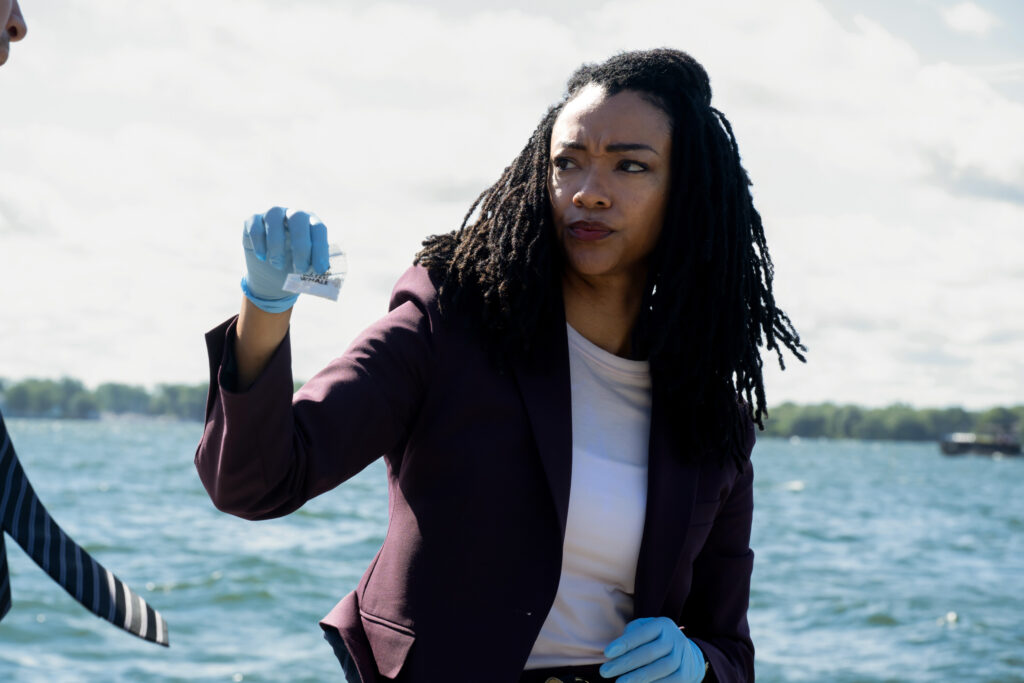 Close-up of Lena with a major clue on Boston Blue Season 1 Episode 3