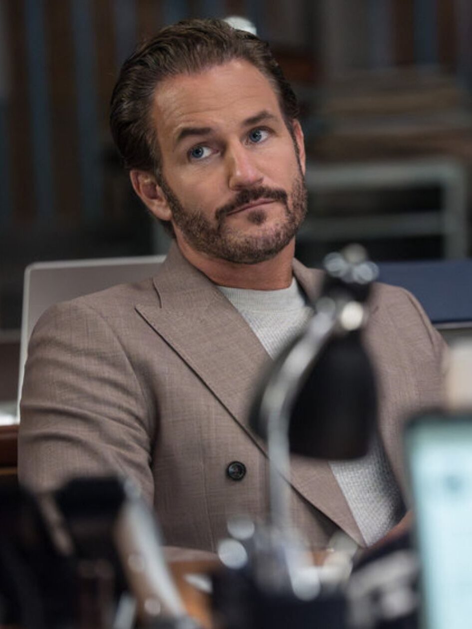 Bruno sits behind his desk on Law & Order: SVU Season 27 Episode 2