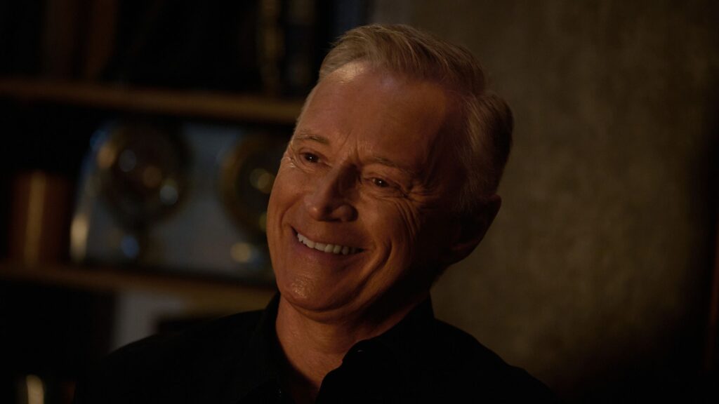 Holmes with an easy smile on Watson Season 2 Episode 2