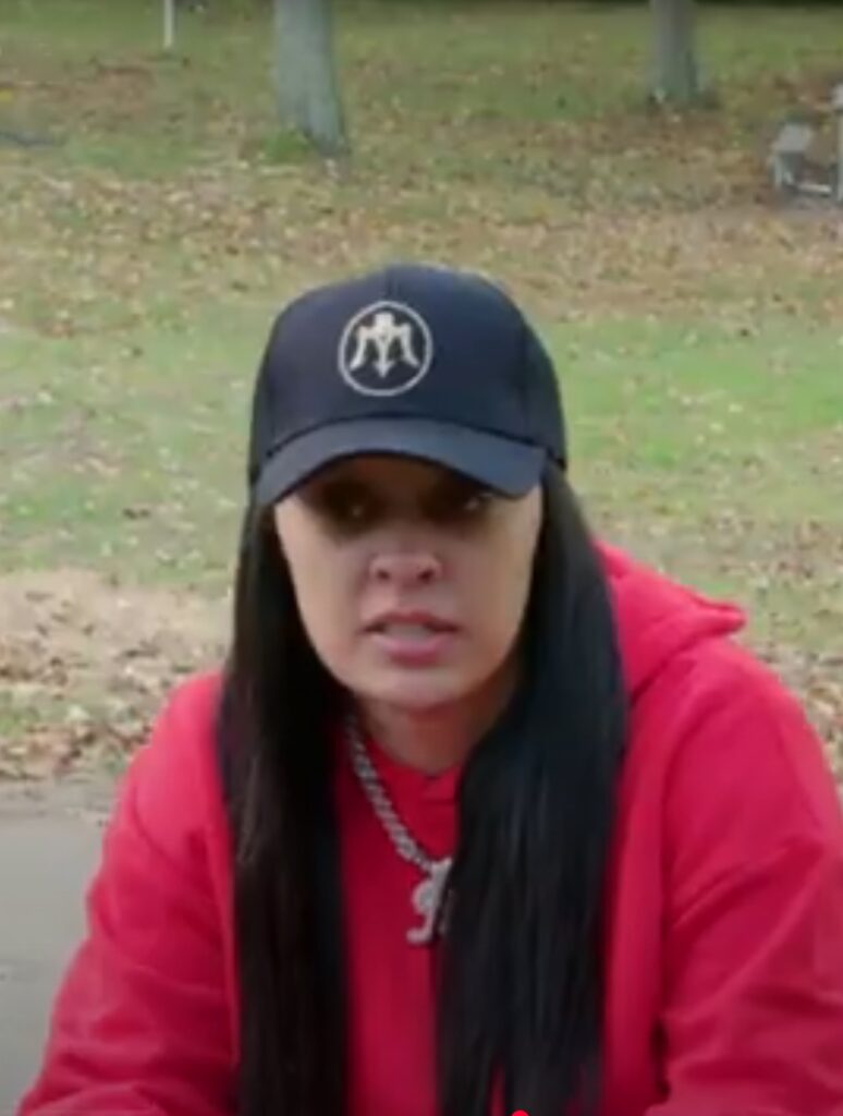 Justine sitting in the park on Life After Lockup