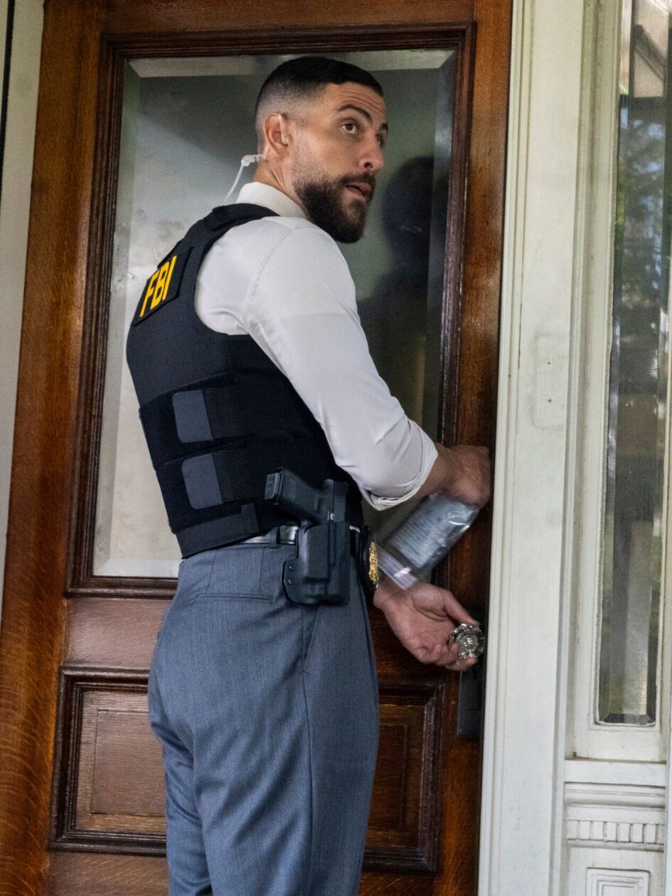 OA tries to get into a house while Maggie stands outside it facing the other way on FBI Season 8 Episode 1