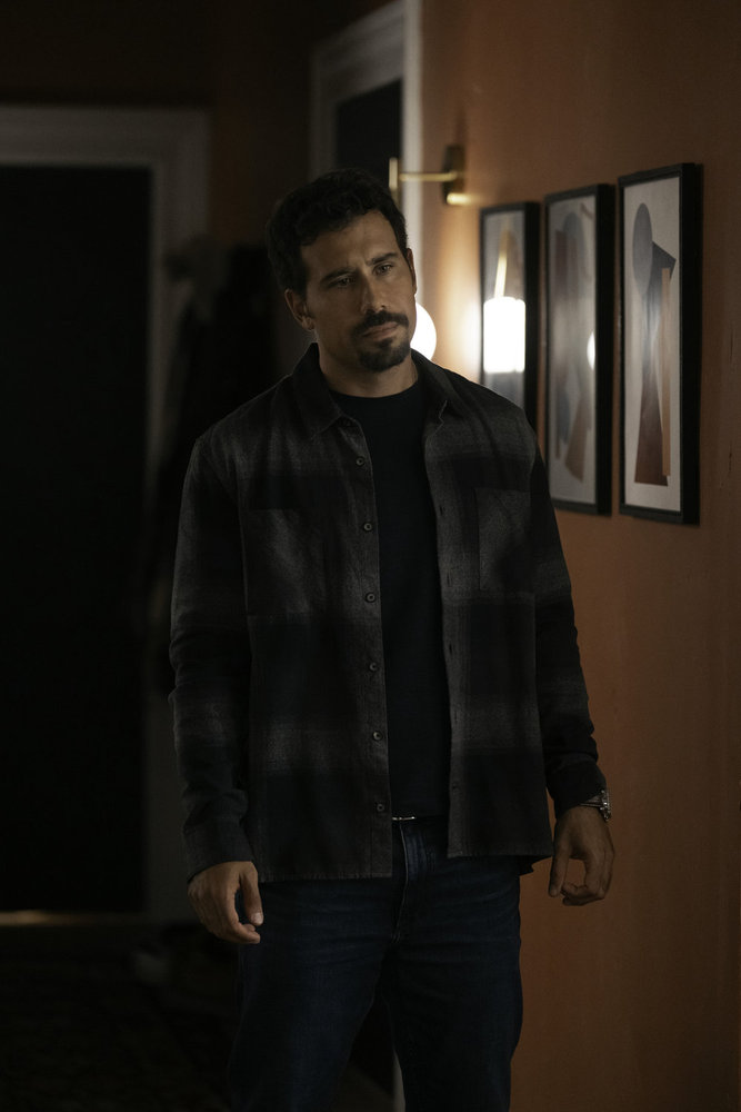 Velasco standing in a hallway on Law & Order: SVU Season 27 Episode 3