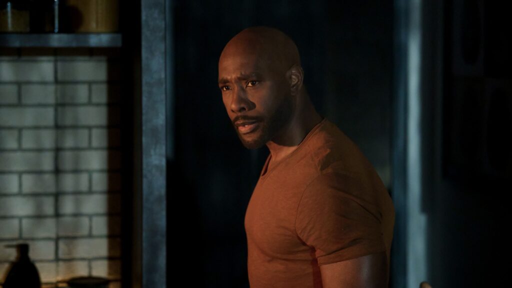 Watson standing in the doorway staring on Watson Season 2 Episode 2