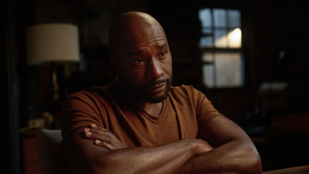Watson with his arms crossed looking annoyed on Watson Season 2 Episode 2