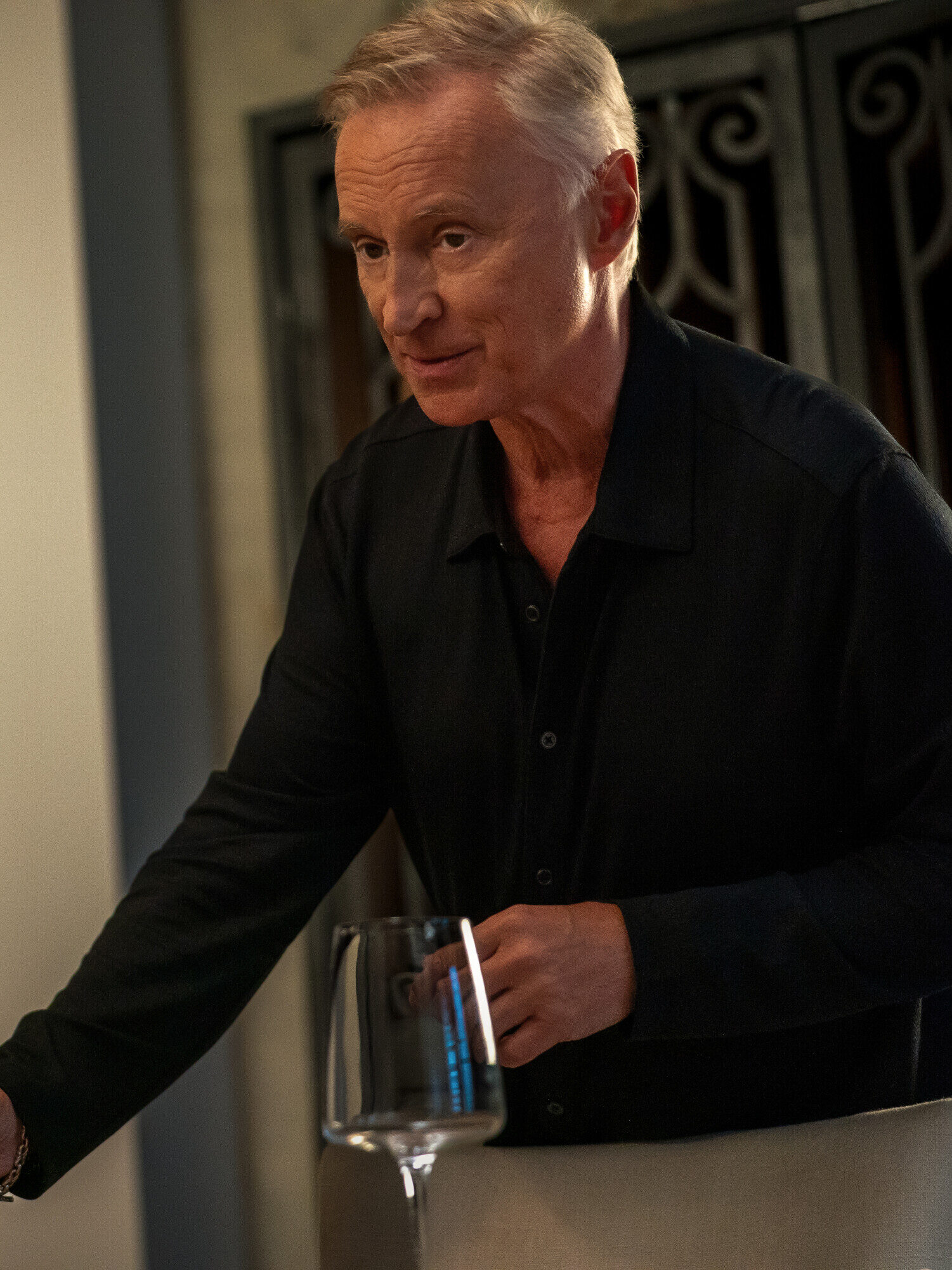 Holmes offers Watson a drink on Watson Season 2 Episode 5