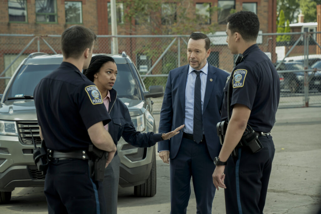 Lena gives instructions to the other cops on Boston Blue Season 1 Episode 4