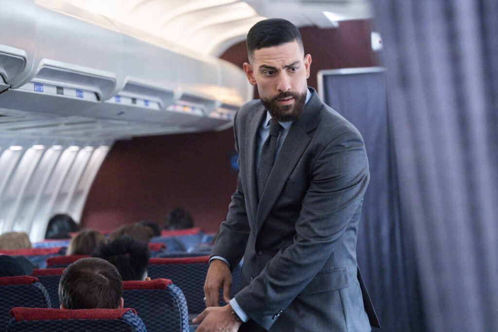 OA tries to protect a woman on a plane on FBI Season 8 Episode 4