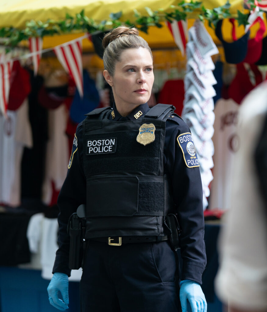 Sarah looks around at the scene of a crime on Boston Blue Season 1 Episode 5