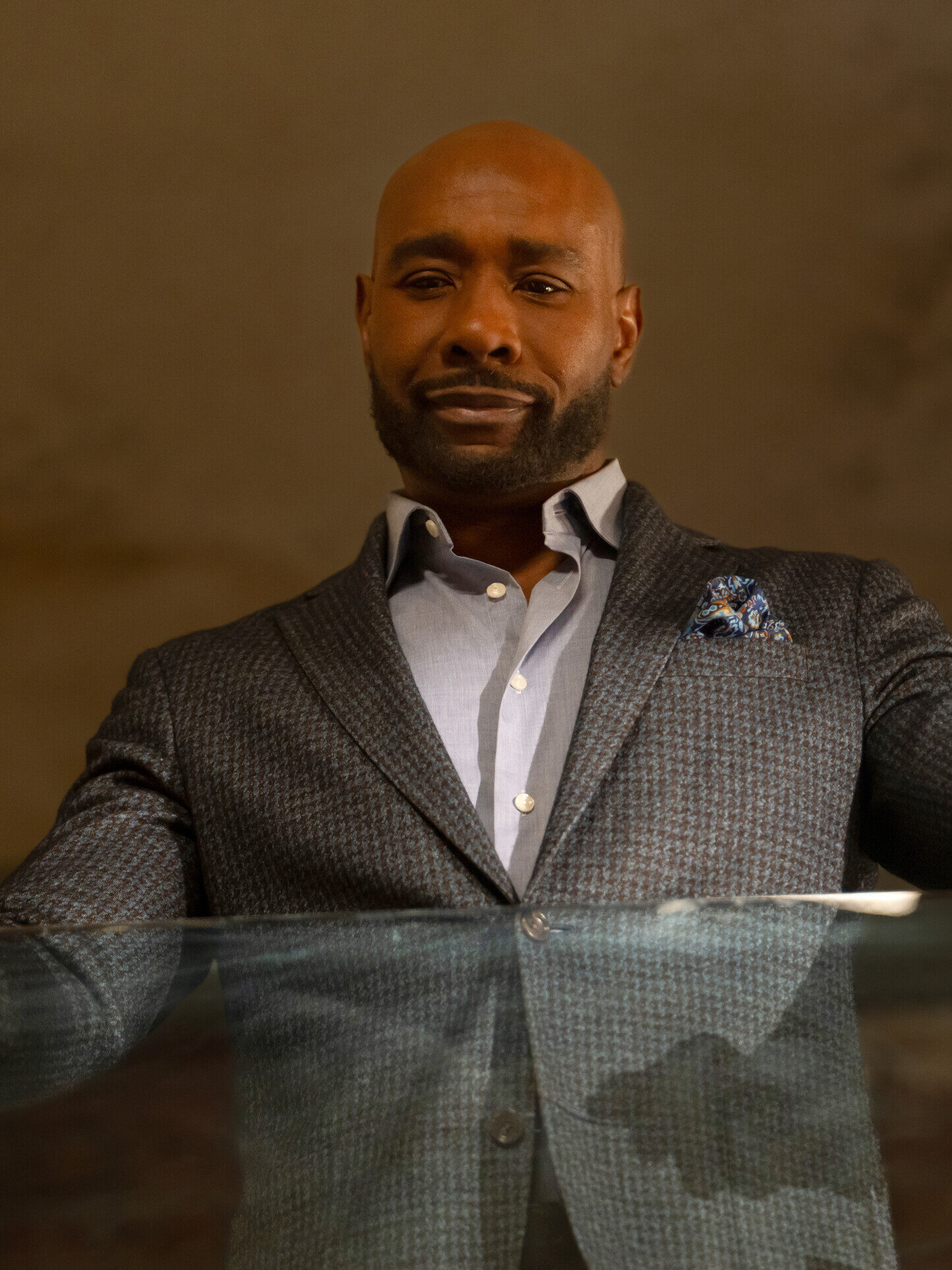 Watson looks down from an observation deck on Watson Season 2 Episode 8