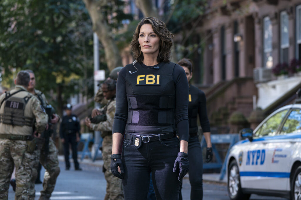 Isobel walking through NYC in full FBI gear on FBI Season 8 Episode 6