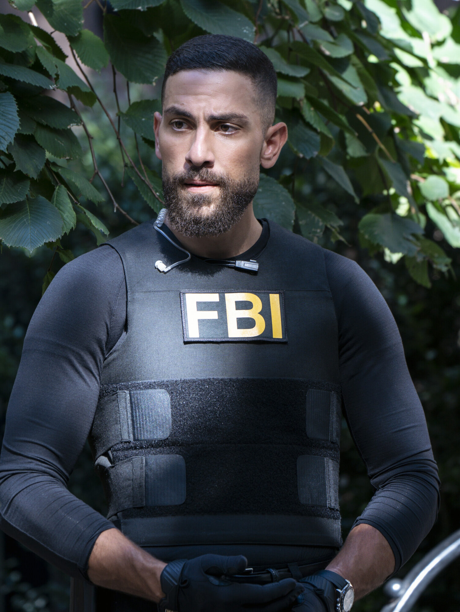 OA standing in the bushes on FBI Season 8 Episode 6