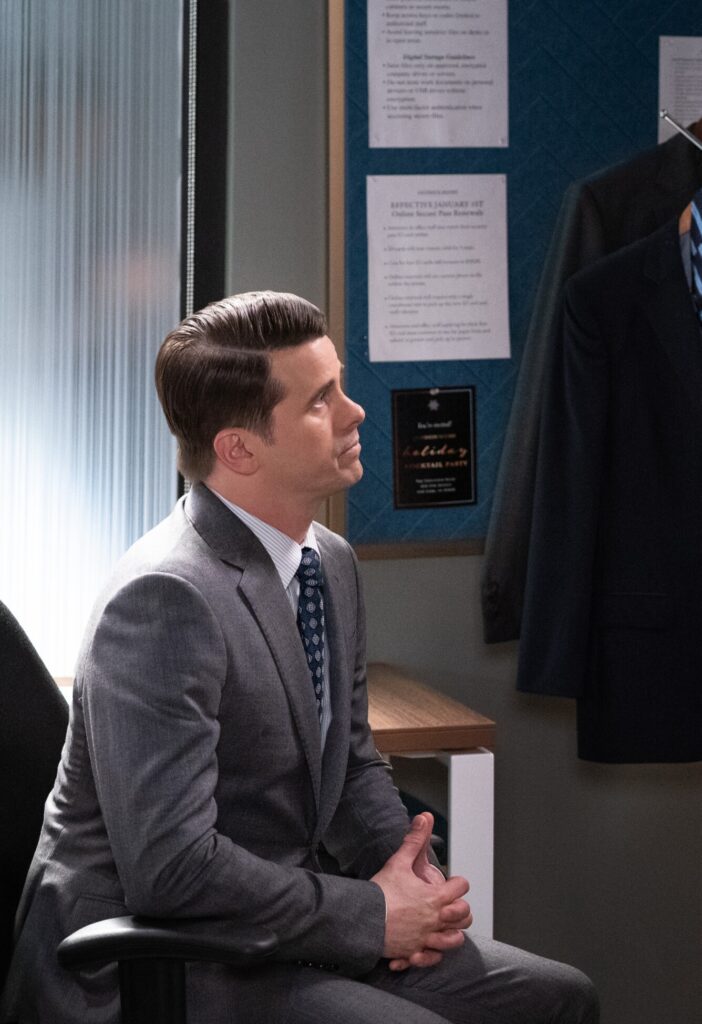 Julian sitting on a chair looking like he wants to forgive Olympia on Matlock Season 2 Episode 8